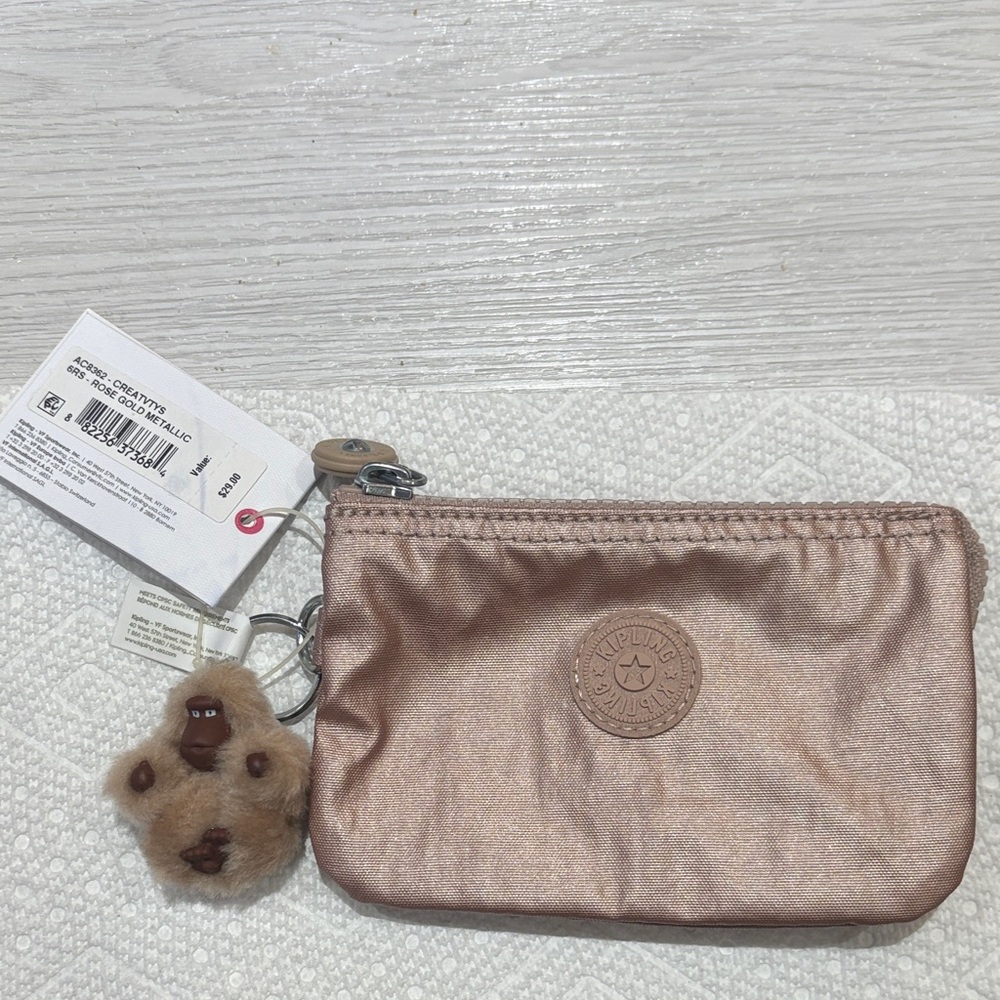 Kipling Shimmering Rose Gold Pouch with Plush Keychain